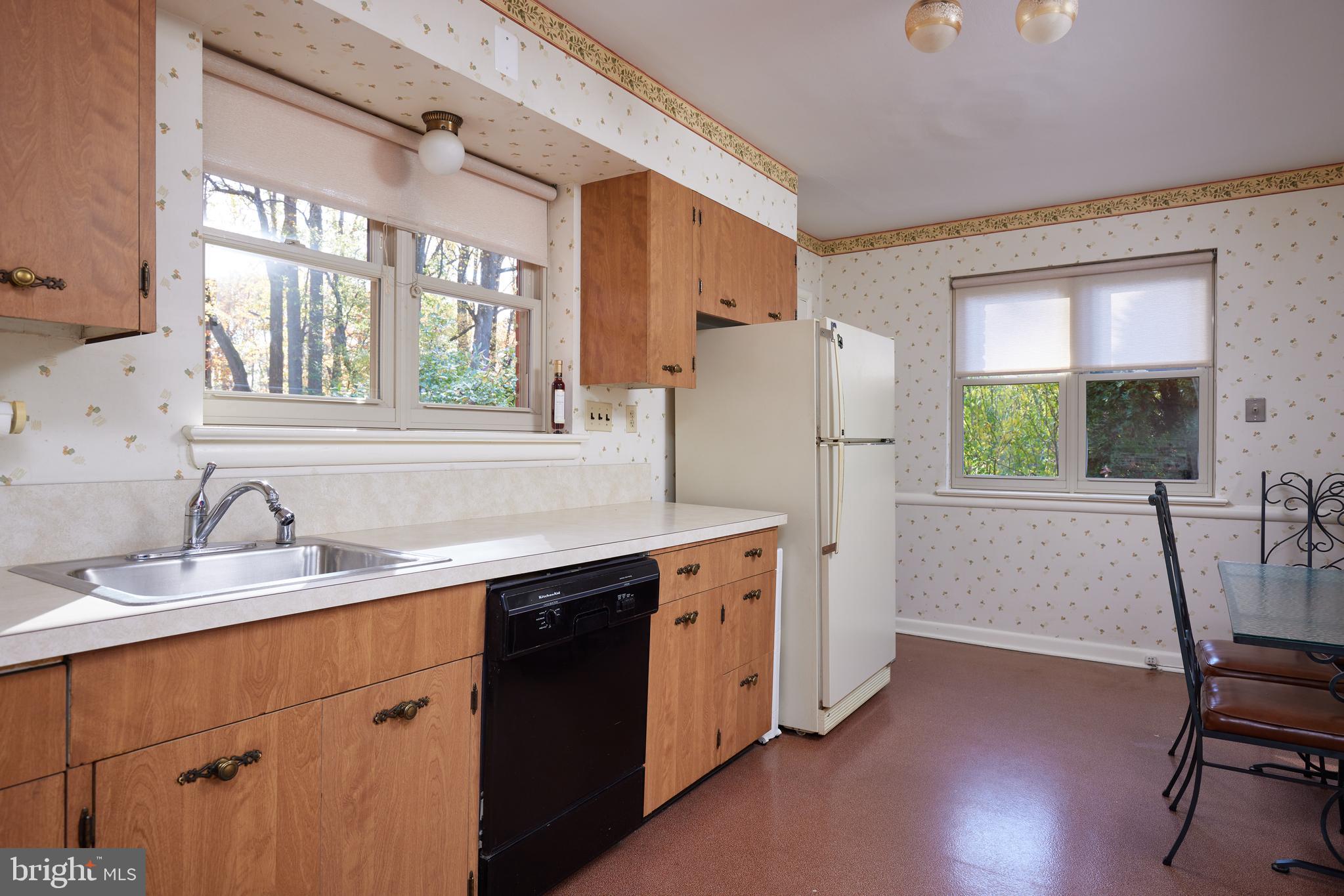 5505 Uppingham Street Chevy Chase, MD 20815 - Photo 8 of 28 Kitchen with Patio Access