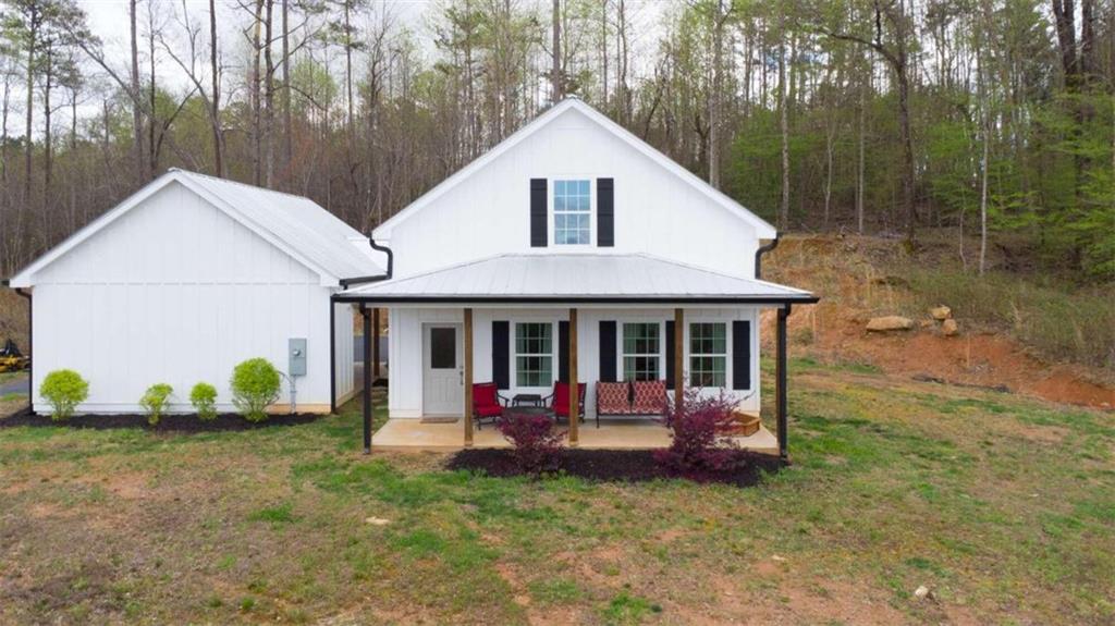 3160 Cannon Bridge Road Demorest, GA 30535 - Photo 1 of 1 a view of a house with backyard and porch