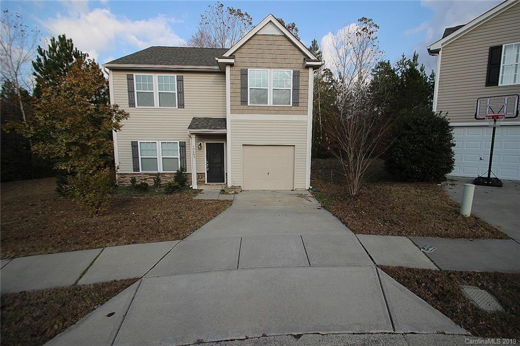 10603 Pointer Ridge Drive Charlotte, NC 28214 - Photo 1 of 37 a front view of a house with a yard