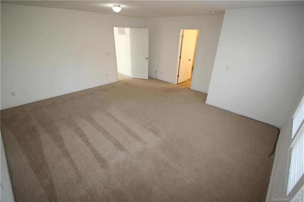 10603 Pointer Ridge Drive Charlotte, NC 28214 - Photo 19 of 37 a view of empty room with window
