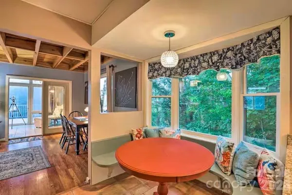 a bedroom with a bed and ceiling fan