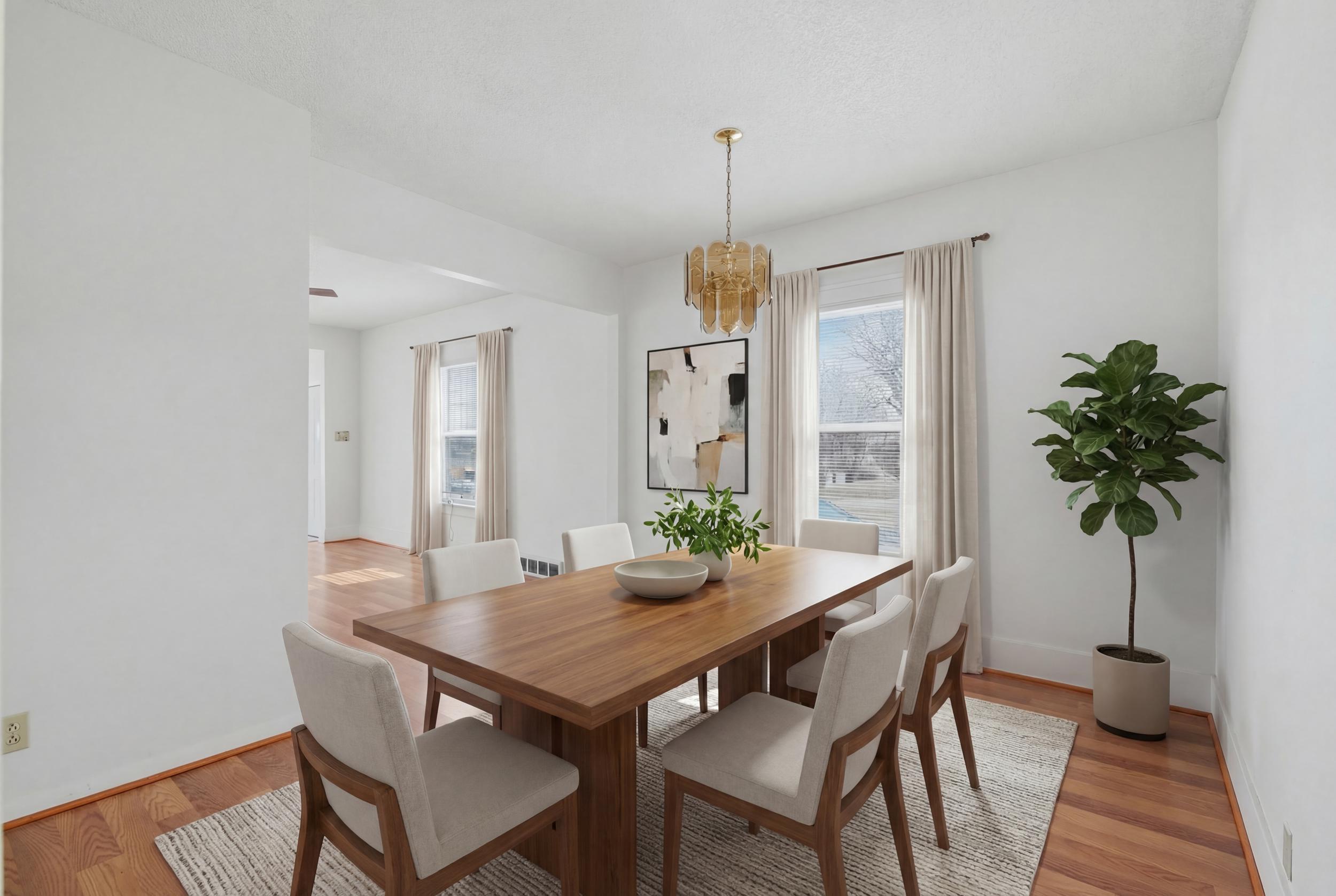 2418 Ridge Road Highland, IN 46322 - Photo 13 of 44 a view of a dining room with furniture window and wooden floor