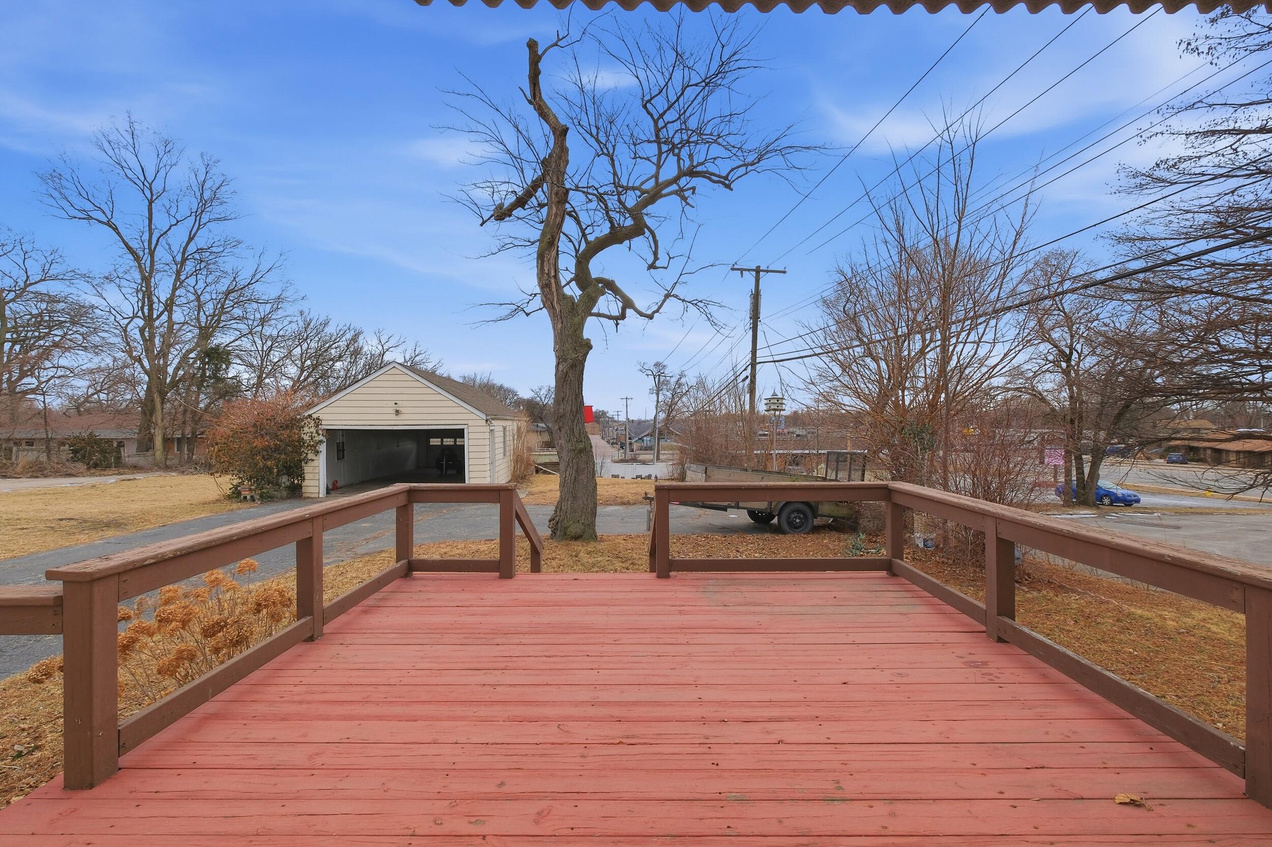2418 Ridge Road Highland, IN 46322 - Photo 30 of 44 a view of a terrace with trees