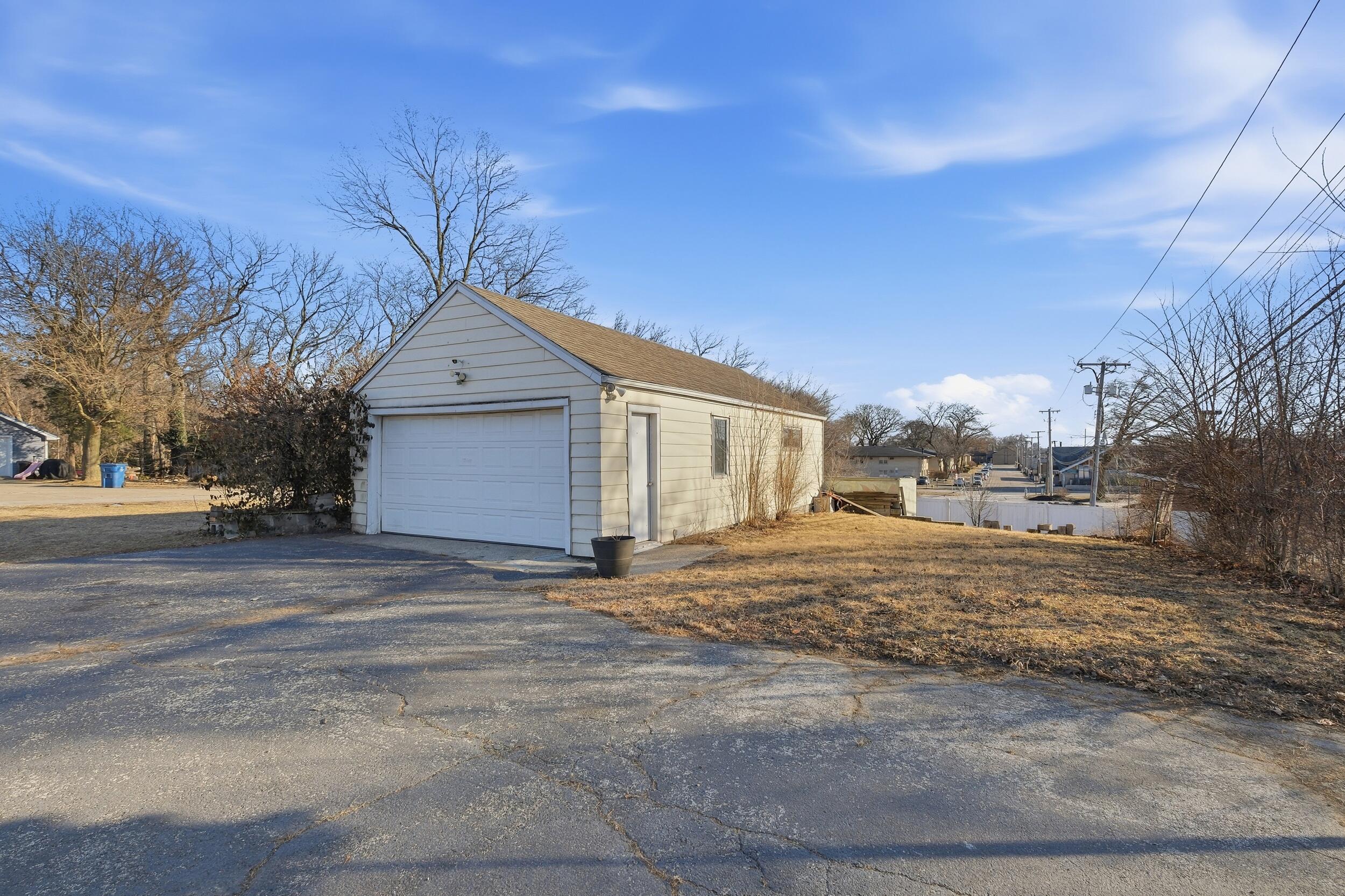 2418 Ridge Road Highland, IN 46322 - Photo 36 of 44 a view of a house with a yard