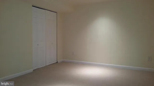 a bathroom with a toilet and a sink