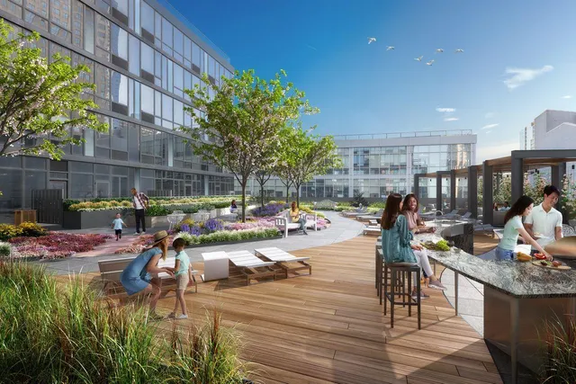 a view of a swimming pool with outdoor seating