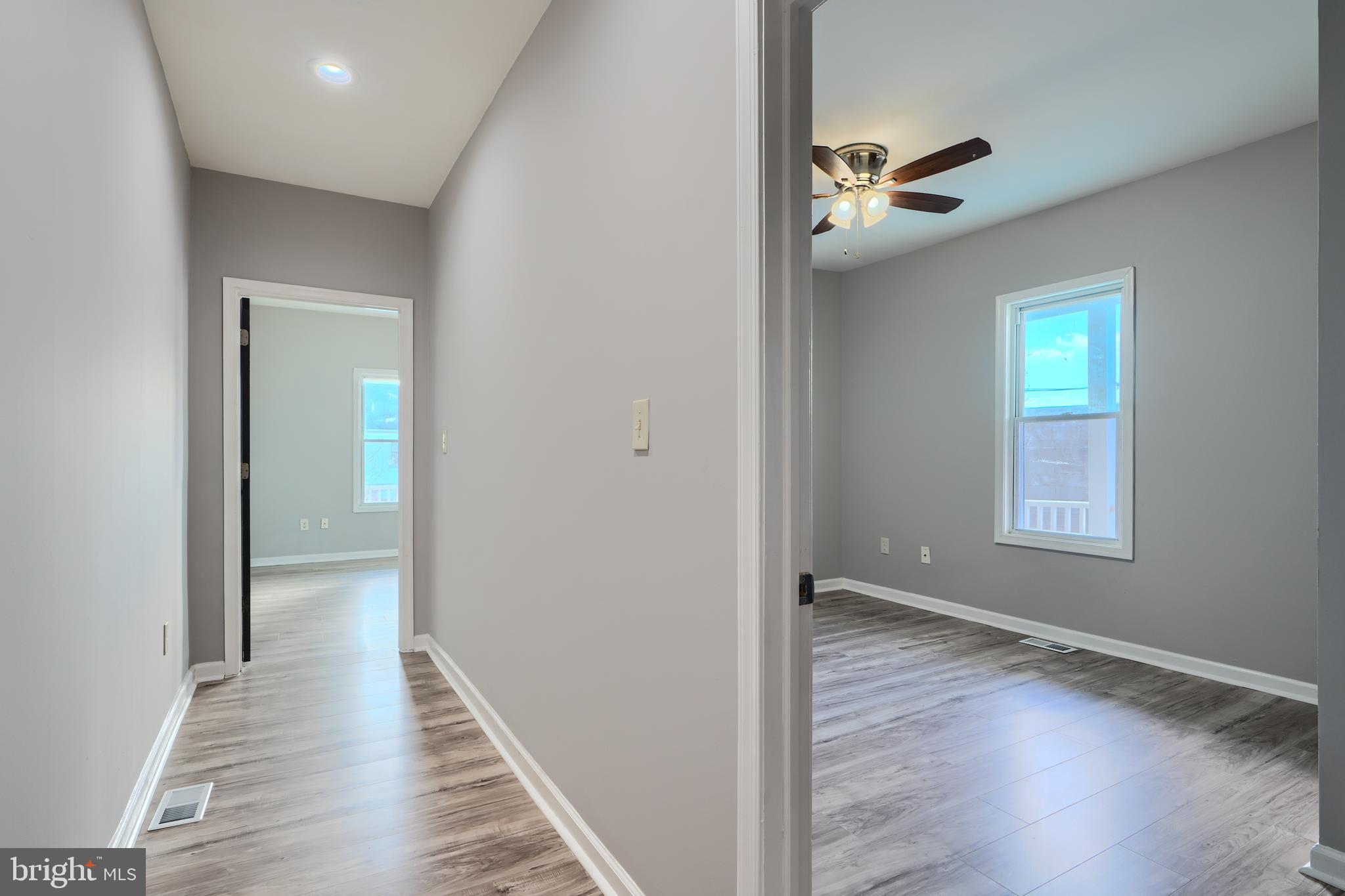 3014 Hamilton Avenue, Unit 1 Baltimore, MD 21214 - Photo 17 of 36 a view of hallway with wooden floor
