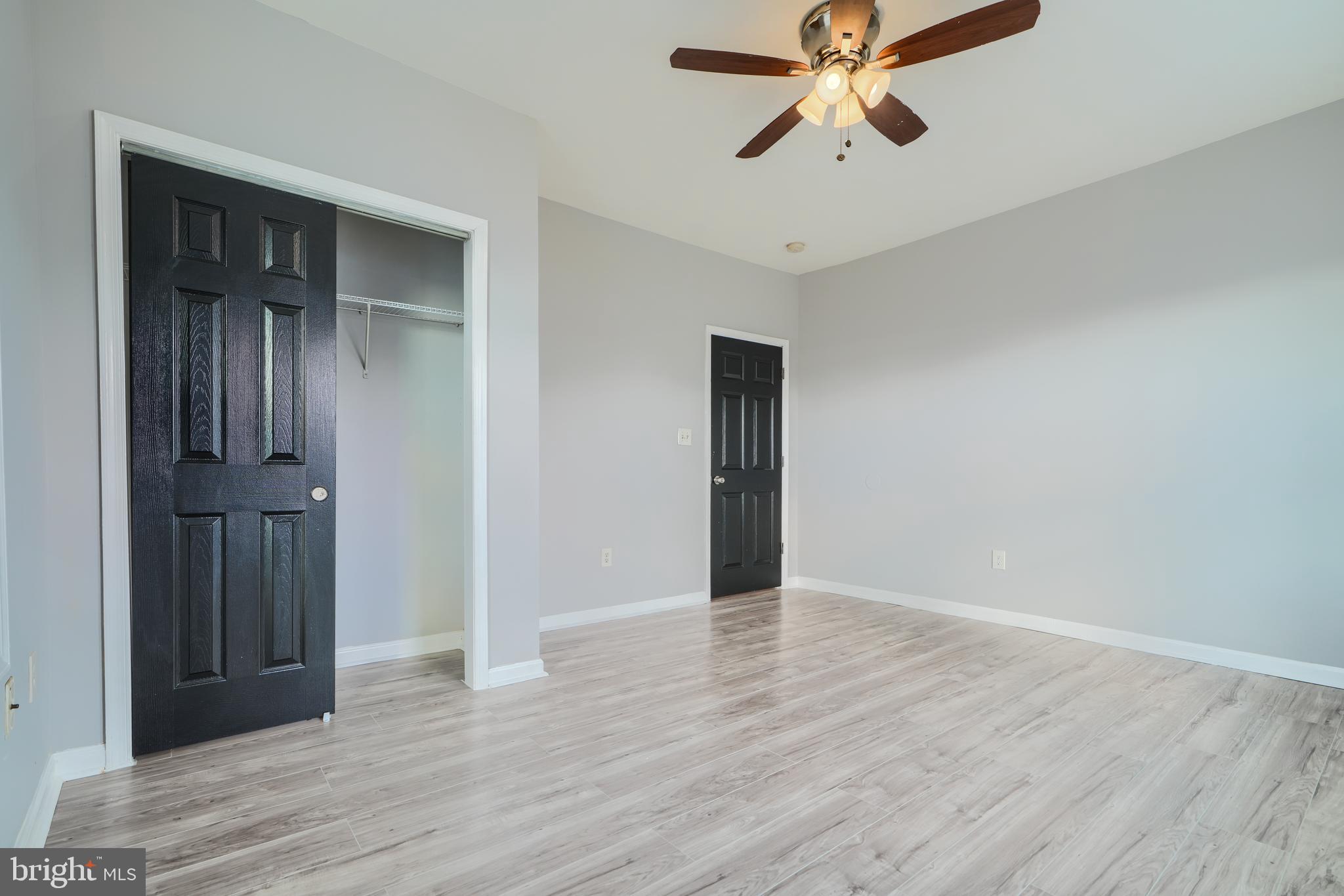 3014 Hamilton Avenue, Unit 1 Baltimore, MD 21214 - Photo 22 of 36 wooden floor in an empty room