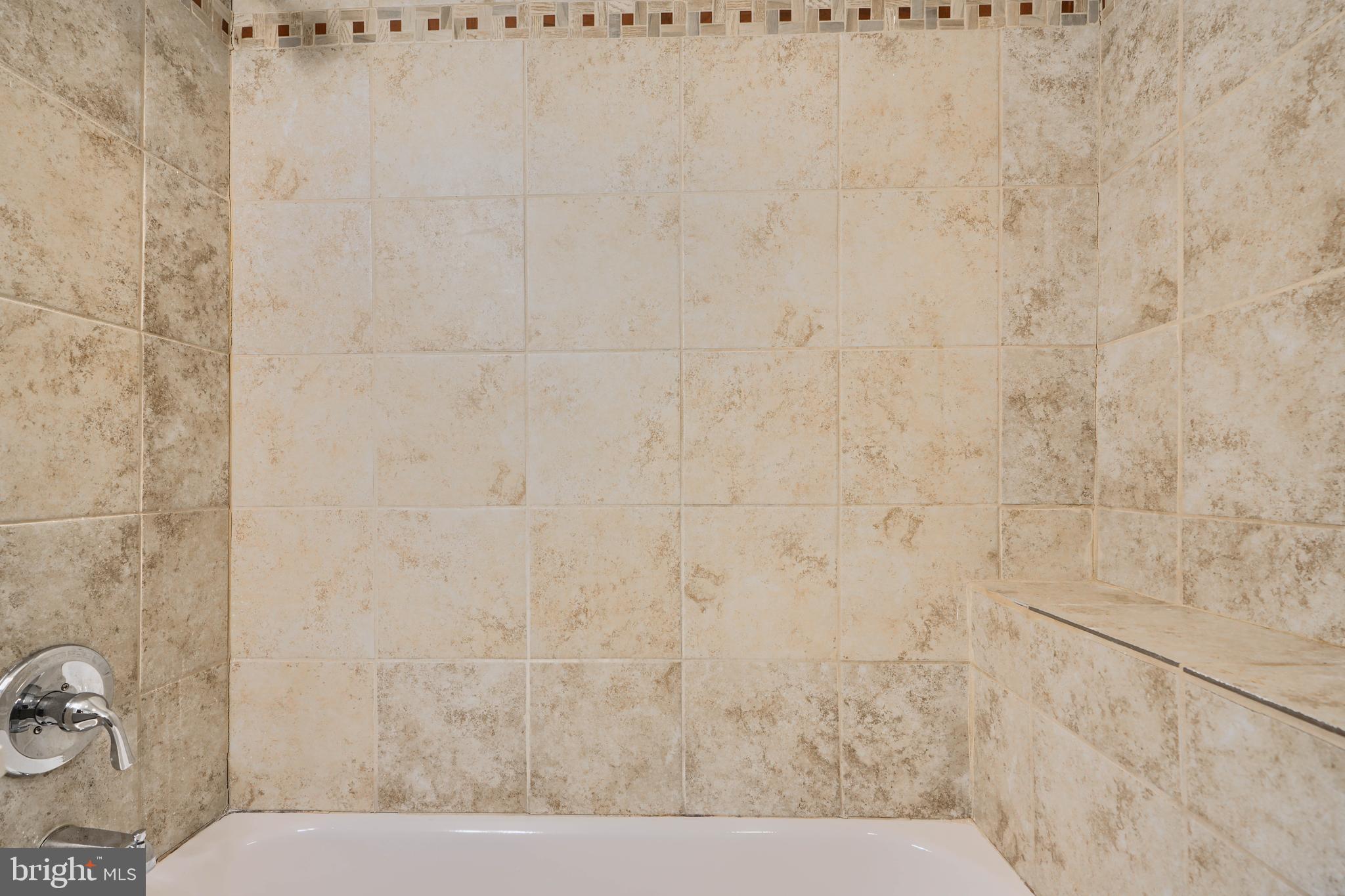 3014 Hamilton Avenue, Unit 1 Baltimore, MD 21214 - Photo 30 of 36 a bathroom with a shower and a toilet