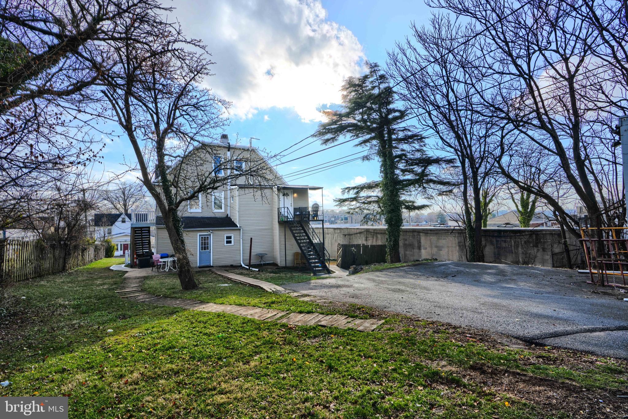 3014 Hamilton Avenue, Unit 1 Baltimore, MD 21214 - Photo 33 of 36 a view of a house with a yard