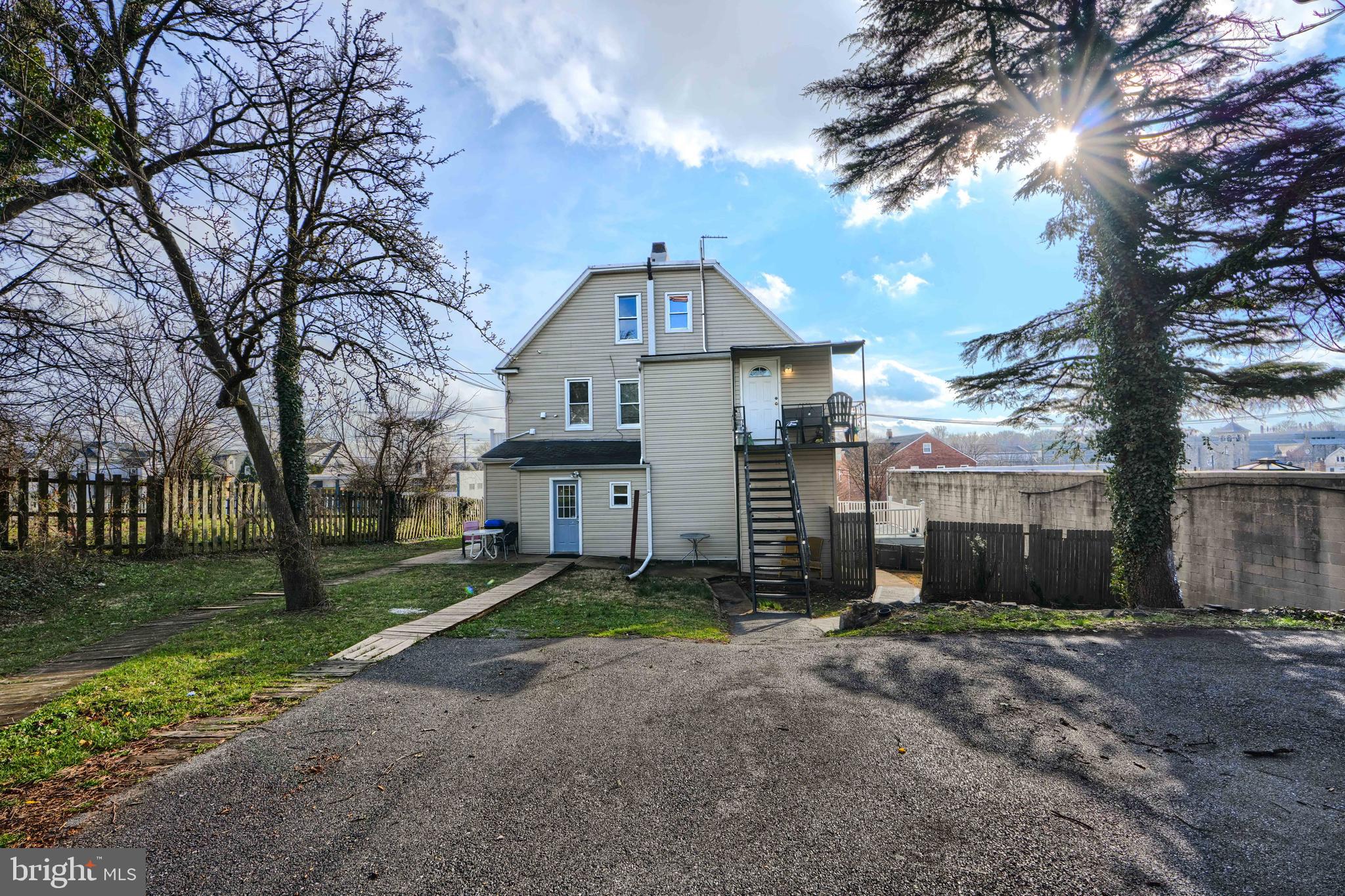 3014 Hamilton Avenue, Unit 1 Baltimore, MD 21214 - Photo 36 of 36 a view of a house with a yard