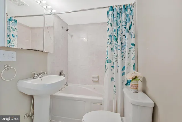 a bathroom with a sink and vanity