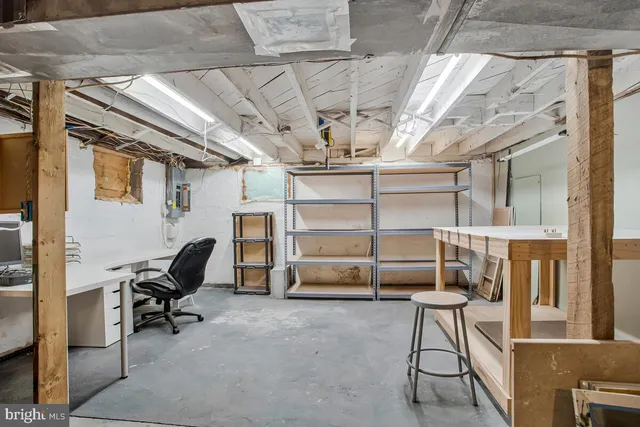 a view of a chairs and table in backyard of the house