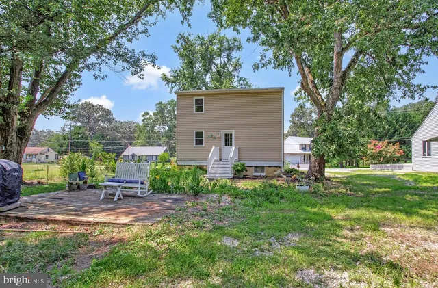 a backyard of a house with seating space