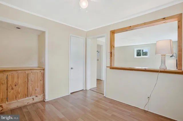 a view of a livingroom with wooden floor