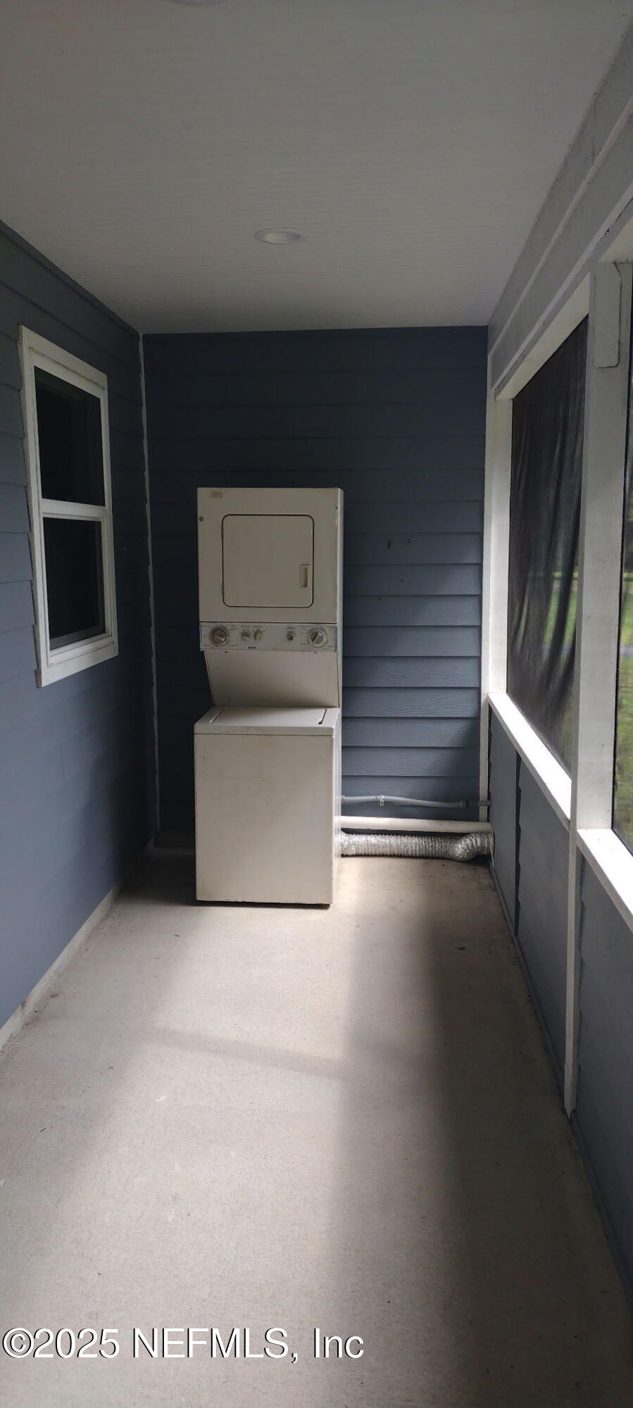 1521 County Road 309, Unit 1 Georgetown, FL 32139 - Photo 7 of 10 a storage room with washer and dryer