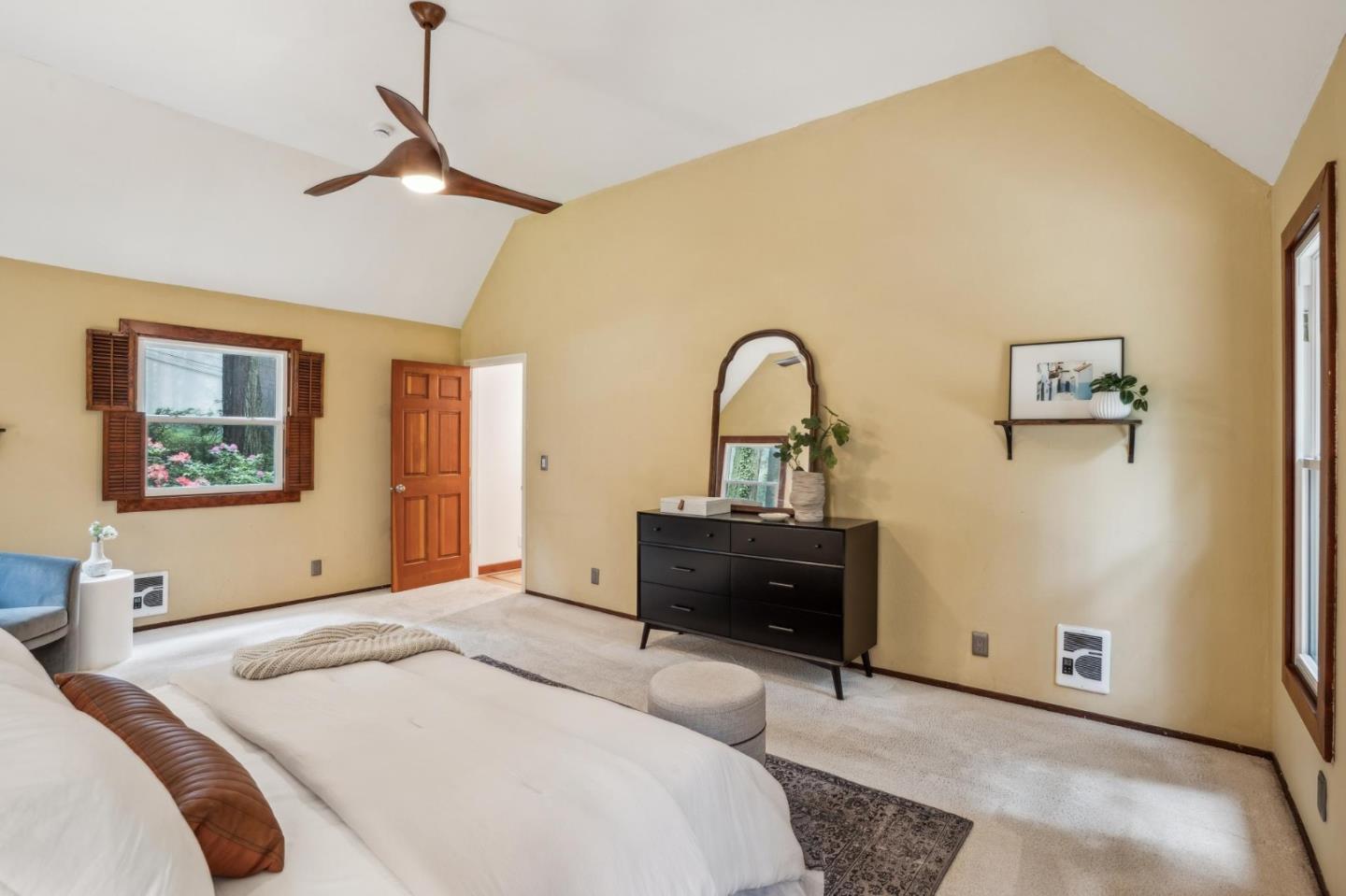 13872 Silver Sky Way Woodside, CA 94062 - Photo 39 of 78 a bedroom with a bed and a dresser