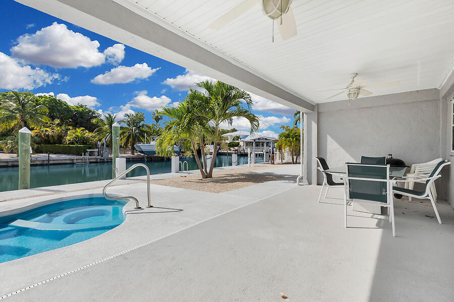 303 Sombrero Beach Road Marathon, FL 33050 - Photo 62 of 84 Side B-Covered outdoor living area