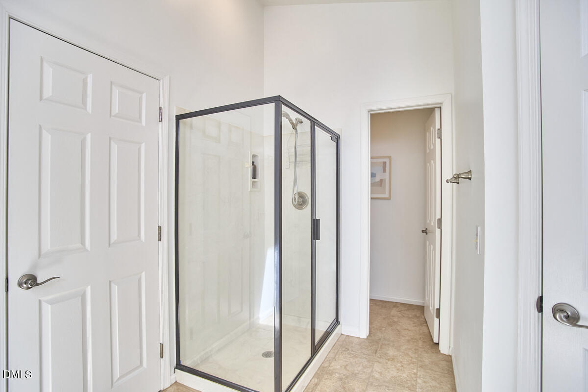 5220 Oakbrook Drive Durham, NC 27713 - Photo 22 of 38 a view of a bathroom with wooden floor