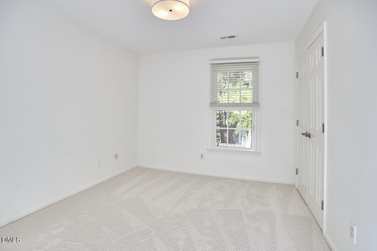 5220 Oakbrook Drive Durham, NC 27713 - Photo 24 of 38 a view of room with window