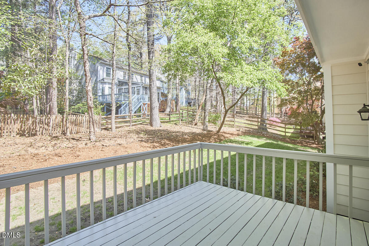 5220 Oakbrook Drive Durham, NC 27713 - Photo 31 of 38 a view of balcony with wooden floor and fence