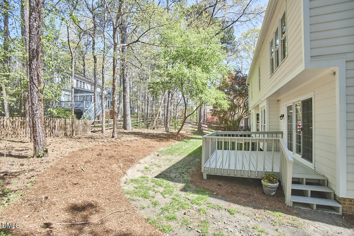 5220 Oakbrook Drive Durham, NC 27713 - Photo 32 of 38 a view of a bench in the patio
