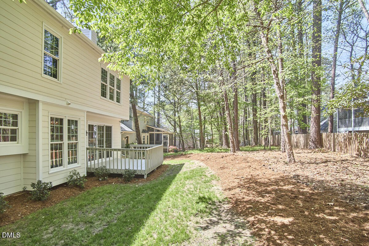 5220 Oakbrook Drive Durham, NC 27713 - Photo 34 of 38 front view of a house with a yard