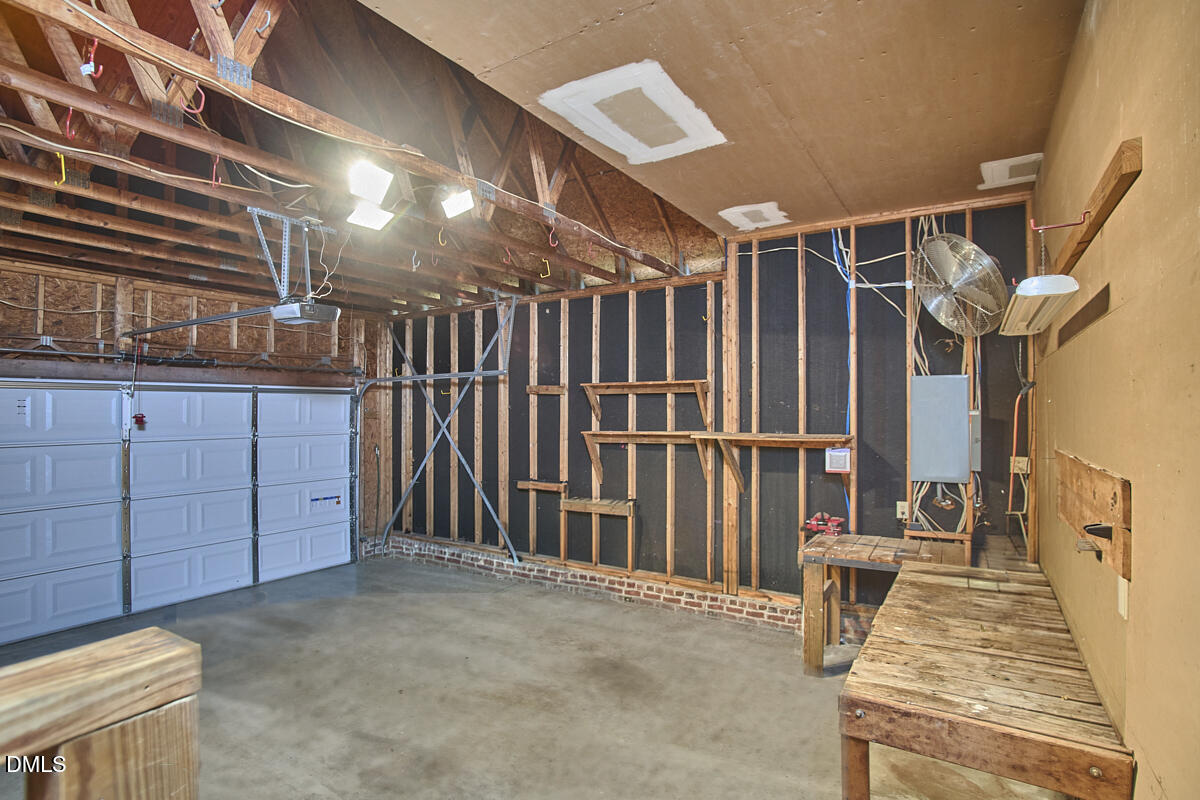 5220 Oakbrook Drive Durham, NC 27713 - Photo 36 of 38 a view of an entryway with wooden floor