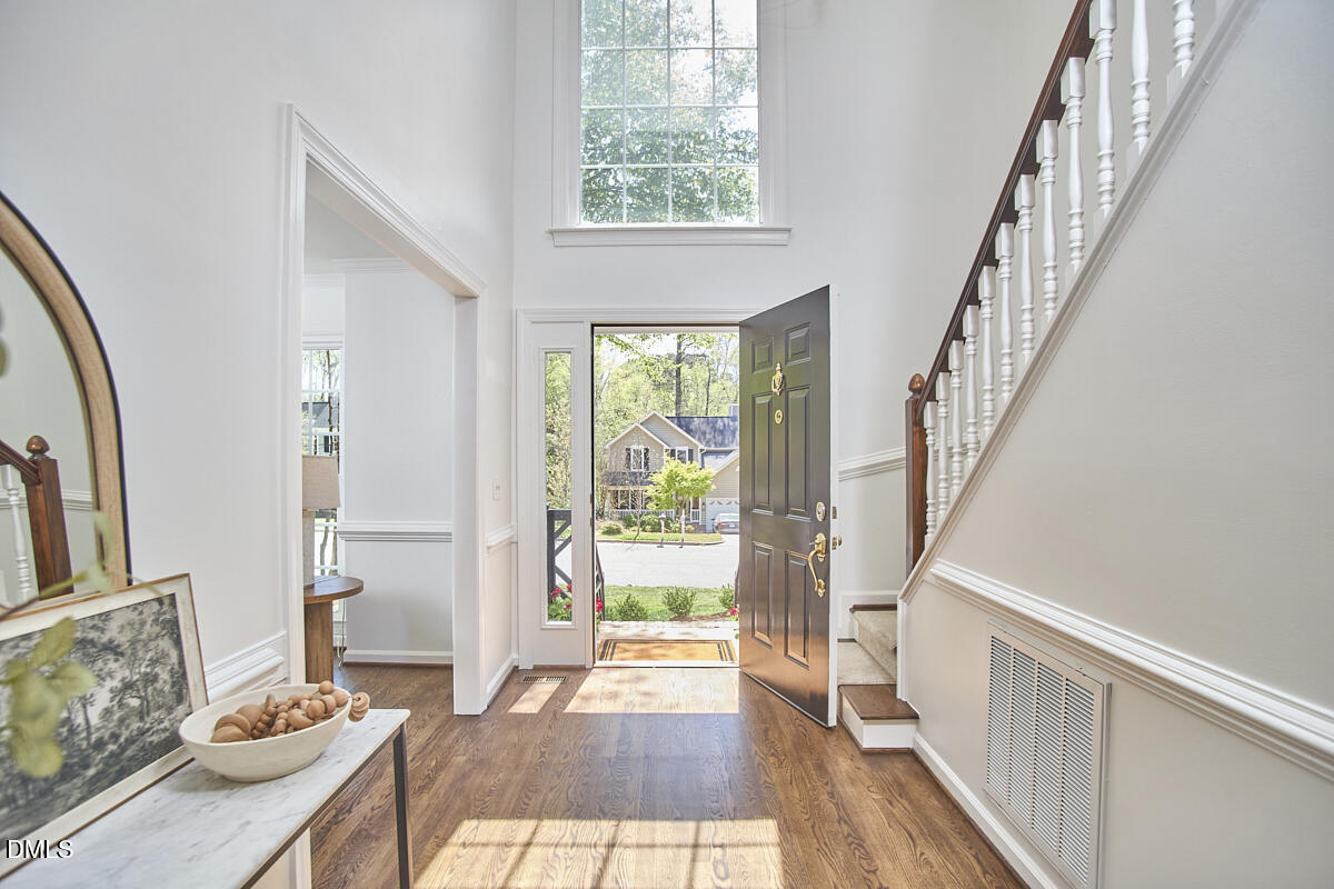 5220 Oakbrook Drive Durham, NC 27713 - Photo 4 of 38 a view of entryway and hall with wooden floor
