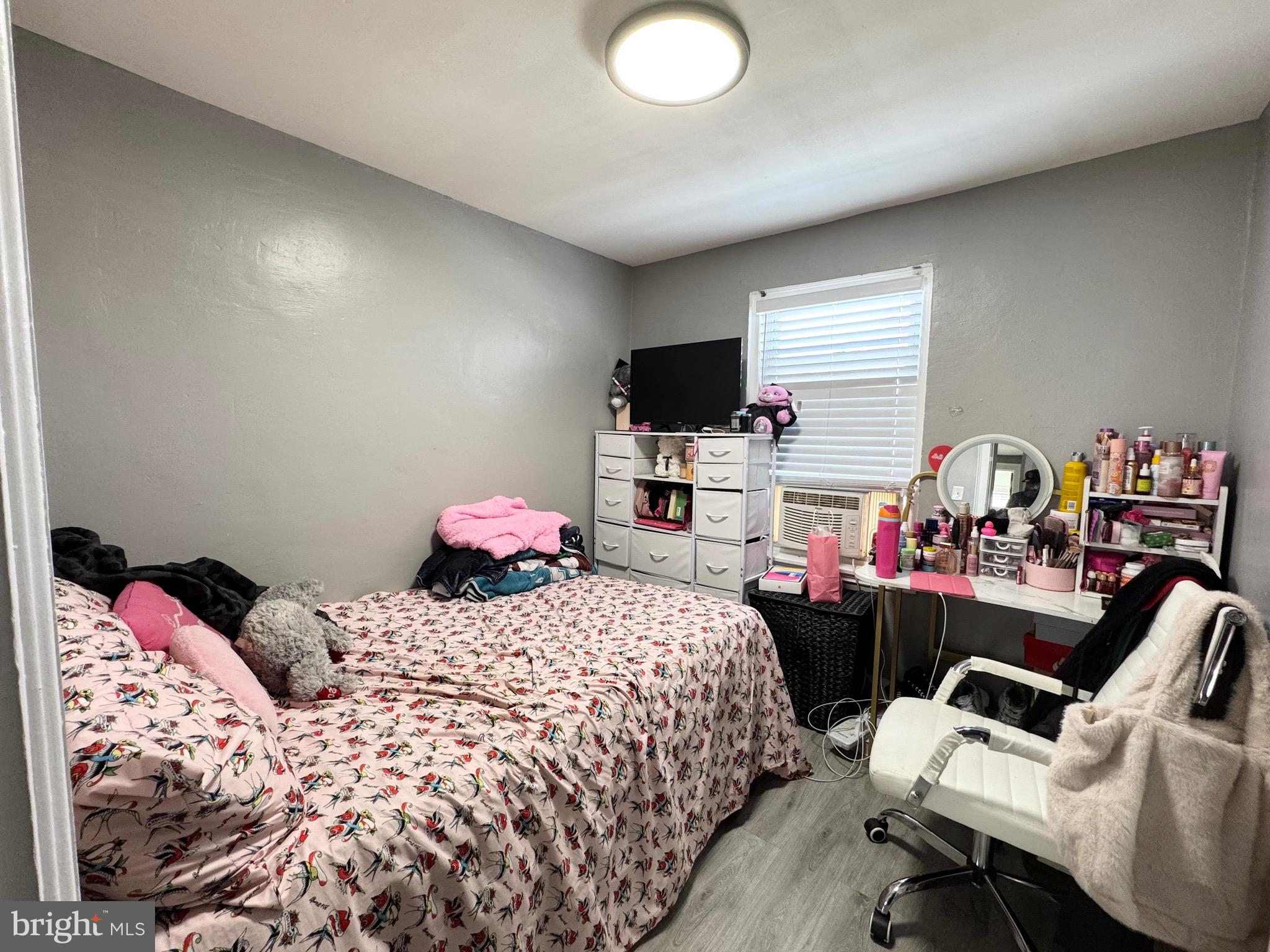 2931 North Constitution Road Camden, NJ 08104 - Photo 11 of 12 a bedroom with a bed and a flat screen tv