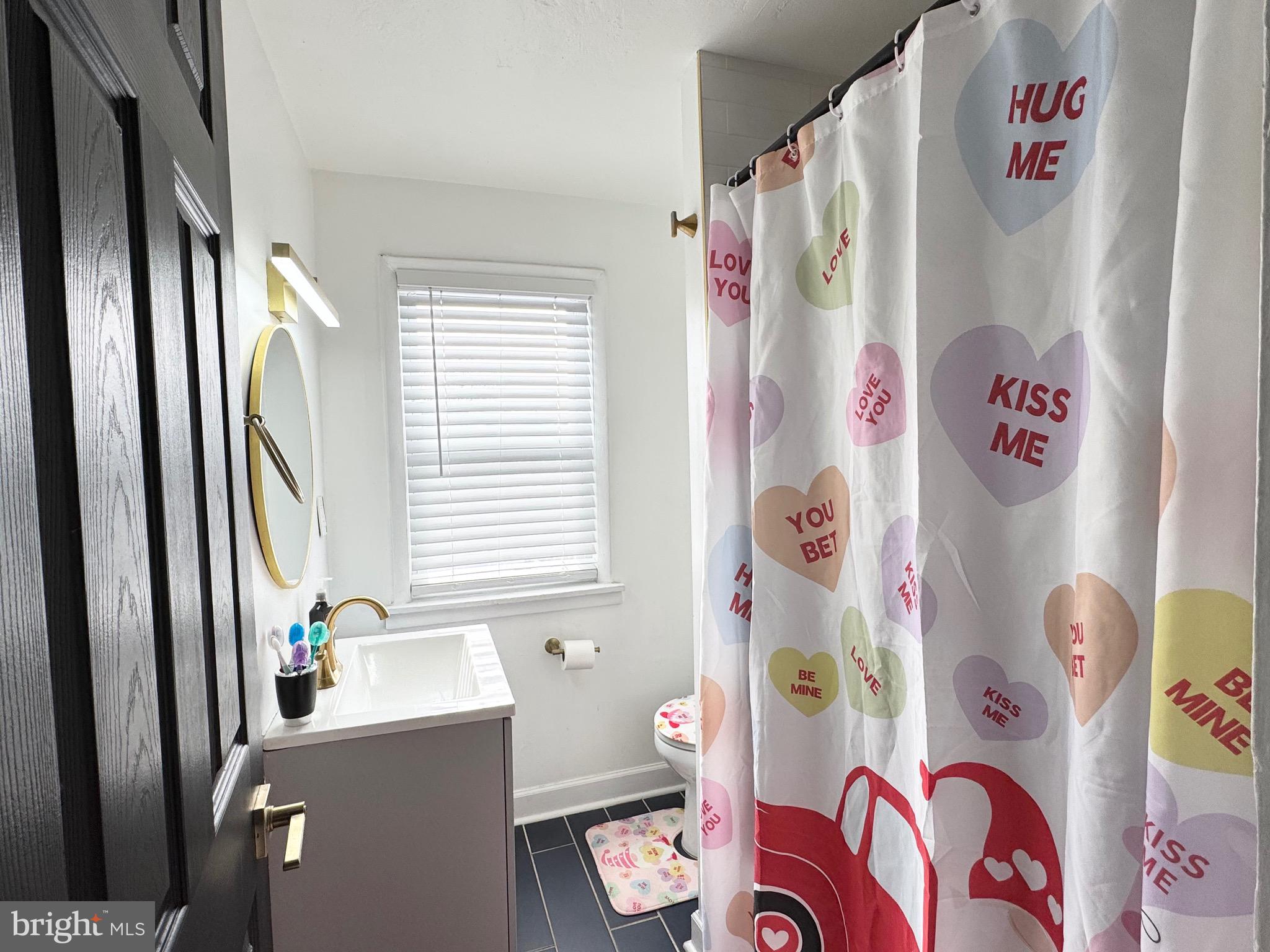 2931 North Constitution Road Camden, NJ 08104 - Photo 8 of 12 a room that has a window and a shower curtain