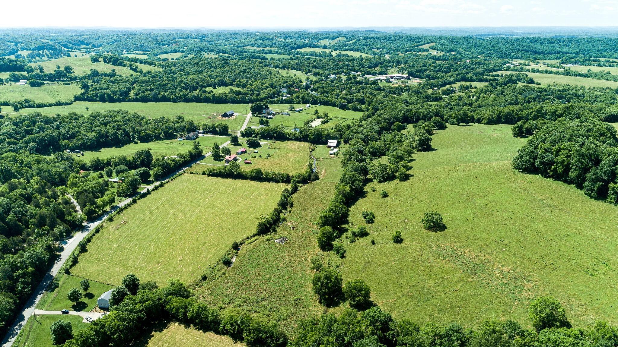 0 Fly Road Santa Fe, TN 38482 - Photo 4 of 15 an aerial view of a residential houses with outdoor space and trees all around