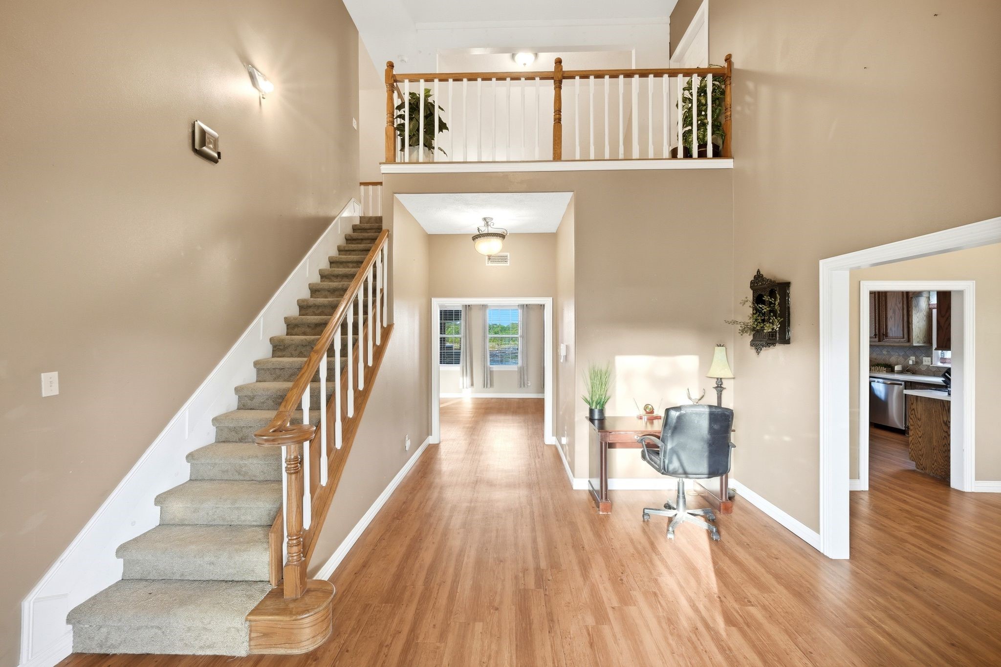 144 Wood Farm Road Huntsville, TX 77320 - Photo 6 of 50 a view of a hallway with wooden floor and staircase