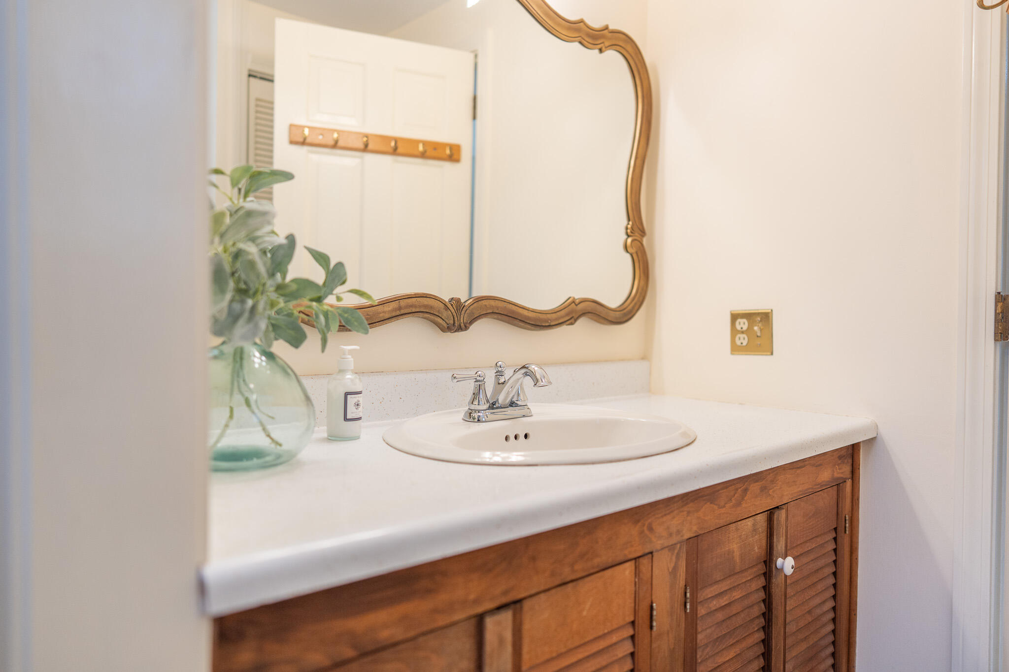 147 Brook Trail Road Brewster, MA 02631 - Photo 20 of 43 a bathroom with a sink and a mirror