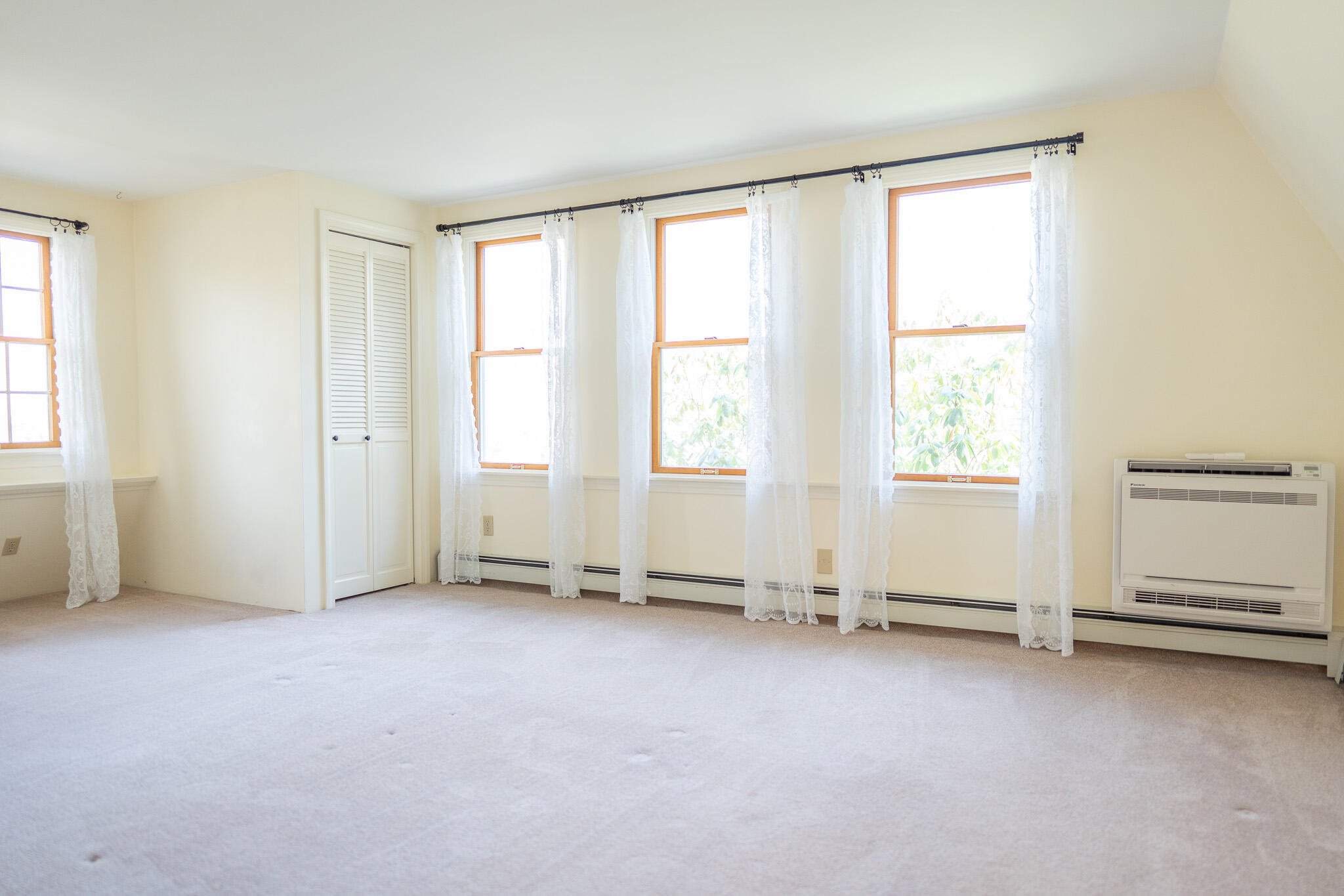 147 Brook Trail Road Brewster, MA 02631 - Photo 27 of 43 an empty room with windows
