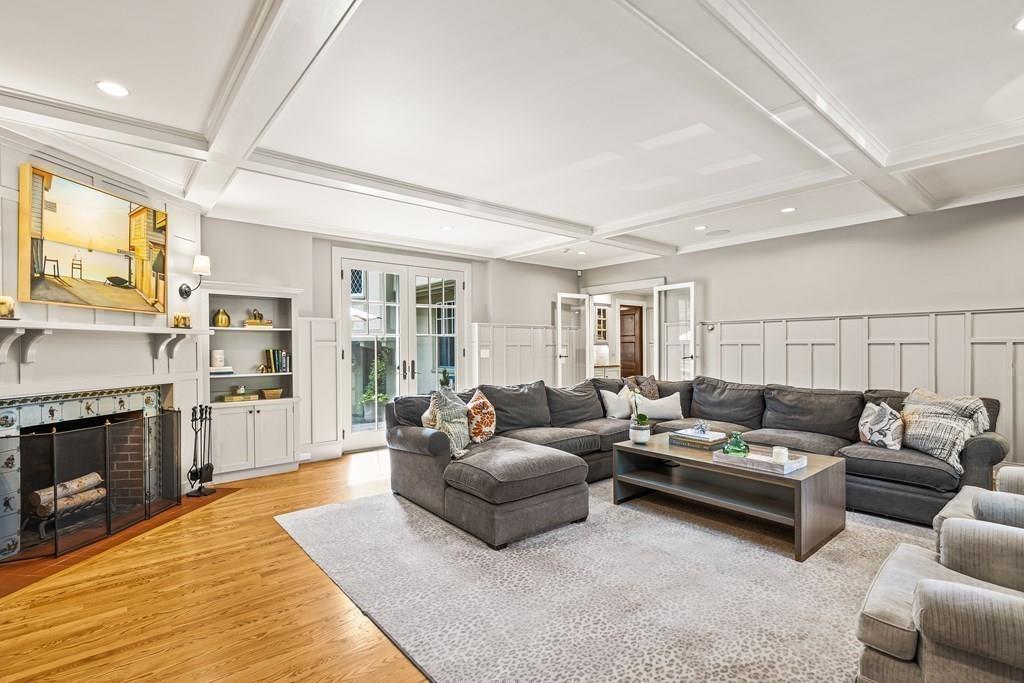 62-66 Temple Road Wellesley, MA 02482 - Photo 12 of 36 a living room with furniture and a fireplace
