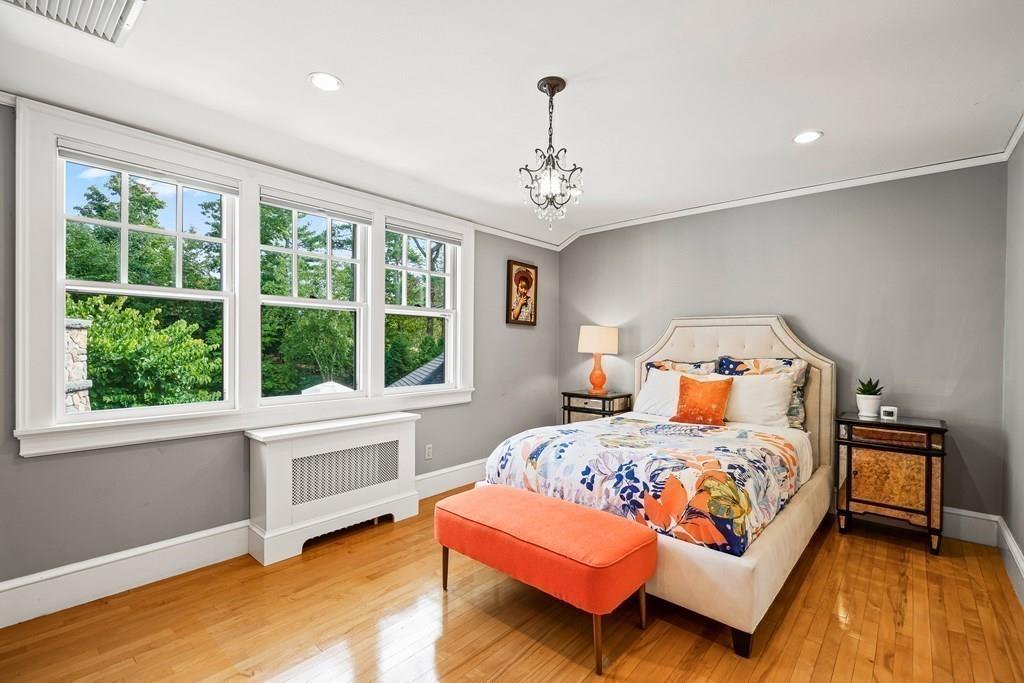 62-66 Temple Road Wellesley, MA 02482 - Photo 18 of 36 a bedroom with a bed and a window