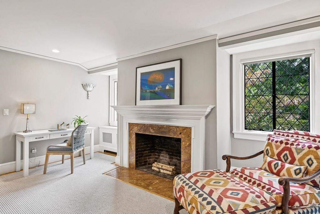 62-66 Temple Road Wellesley, MA 02482 - Photo 19 of 36 a bedroom with a bed and a fireplace