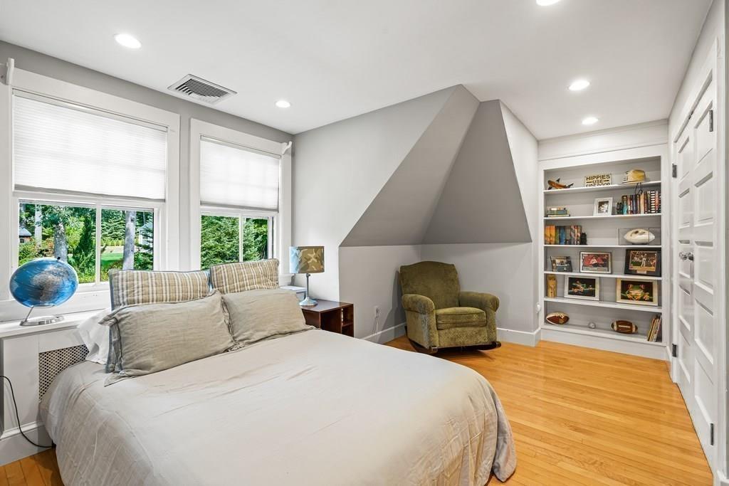 62-66 Temple Road Wellesley, MA 02482 - Photo 20 of 36 a bedroom with a large bed and a large window