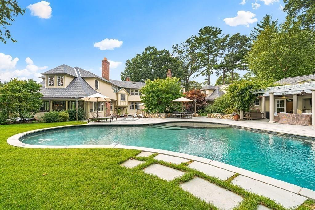 62-66 Temple Road Wellesley, MA 02482 - Photo 2 of 36 a view of a house with swimming pool and a yard