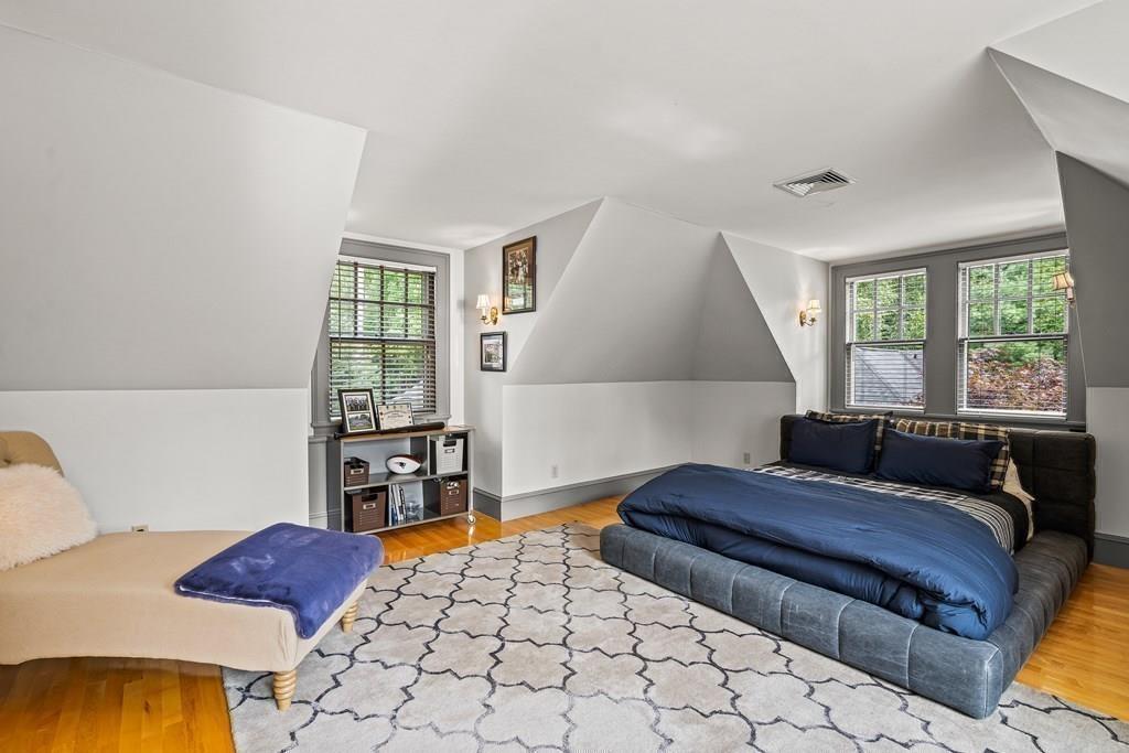 62-66 Temple Road Wellesley, MA 02482 - Photo 21 of 36 a bedroom with a large bed and a window