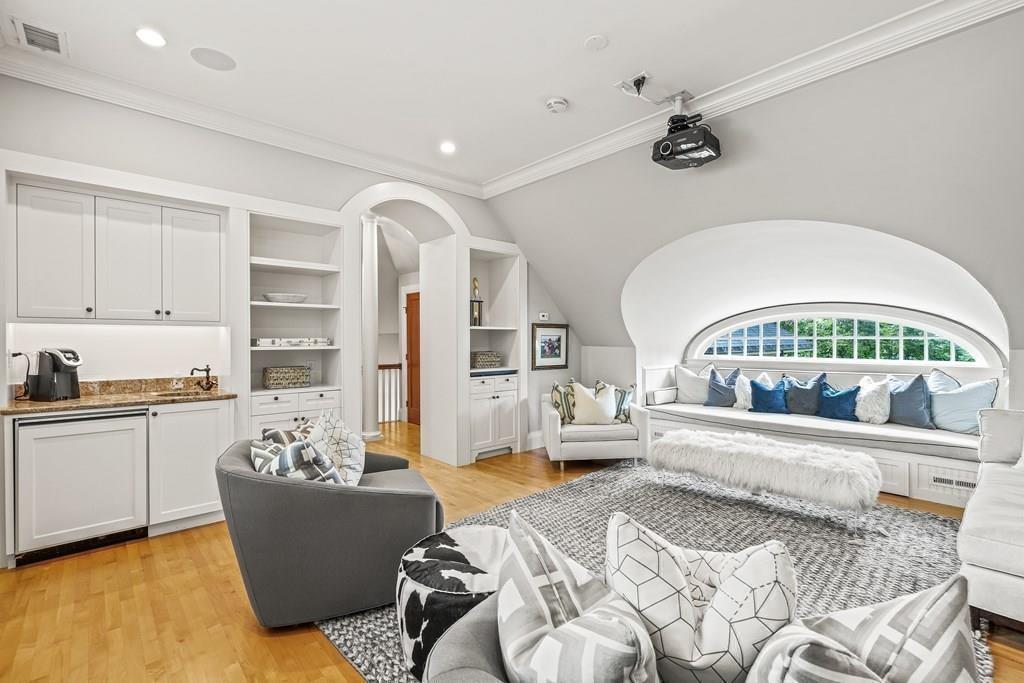 62-66 Temple Road Wellesley, MA 02482 - Photo 22 of 36 a living room with furniture and a large window