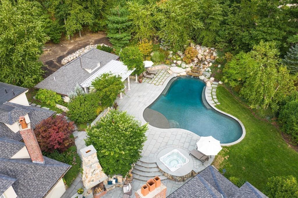 62-66 Temple Road Wellesley, MA 02482 - Photo 26 of 36 an aerial view of a house with a swimming pool