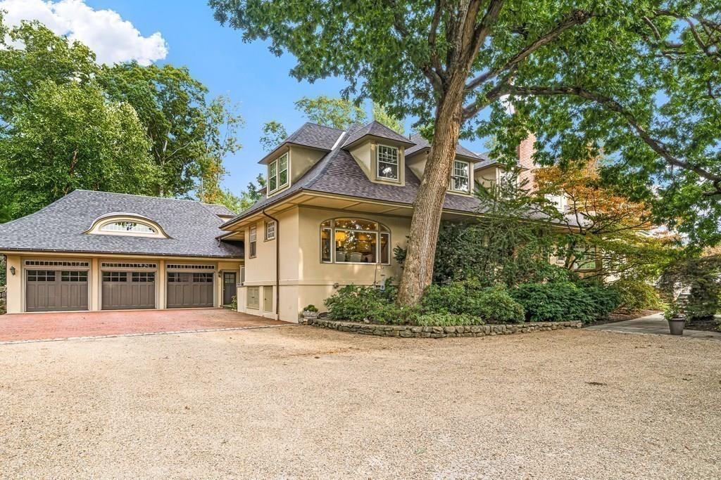 62-66 Temple Road Wellesley, MA 02482 - Photo 3 of 36 a front view of a house with a garden