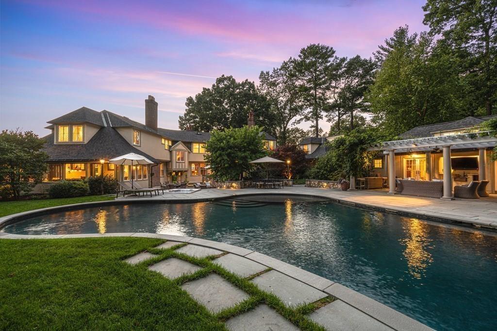 62-66 Temple Road Wellesley, MA 02482 - Photo 34 of 36 a view of a house with a yard and a large tree