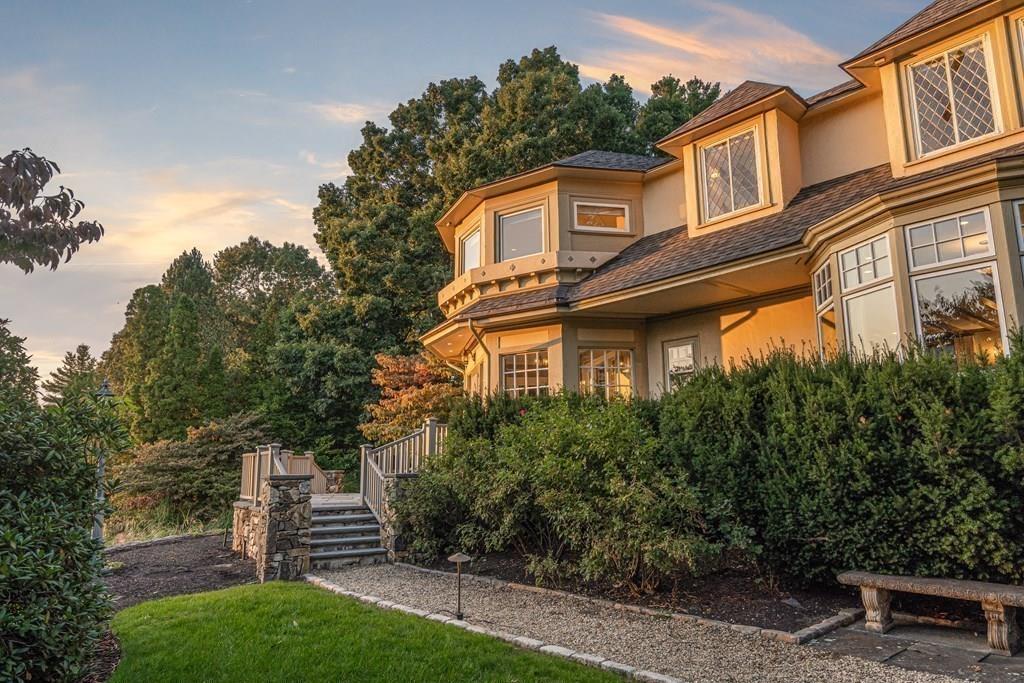 62-66 Temple Road Wellesley, MA 02482 - Photo 35 of 36 a front view of a house with a yard