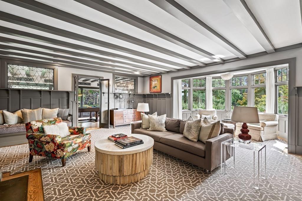62-66 Temple Road Wellesley, MA 02482 - Photo 5 of 36 a living room with furniture and a large window