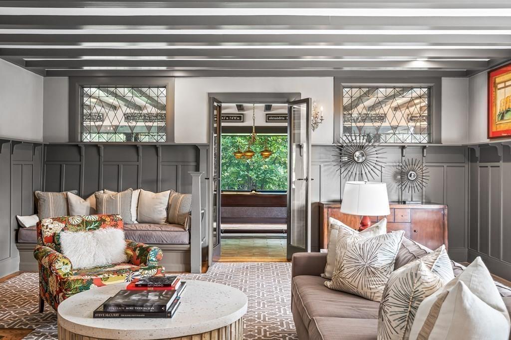 62-66 Temple Road Wellesley, MA 02482 - Photo 6 of 36 a living room with furniture and a large window