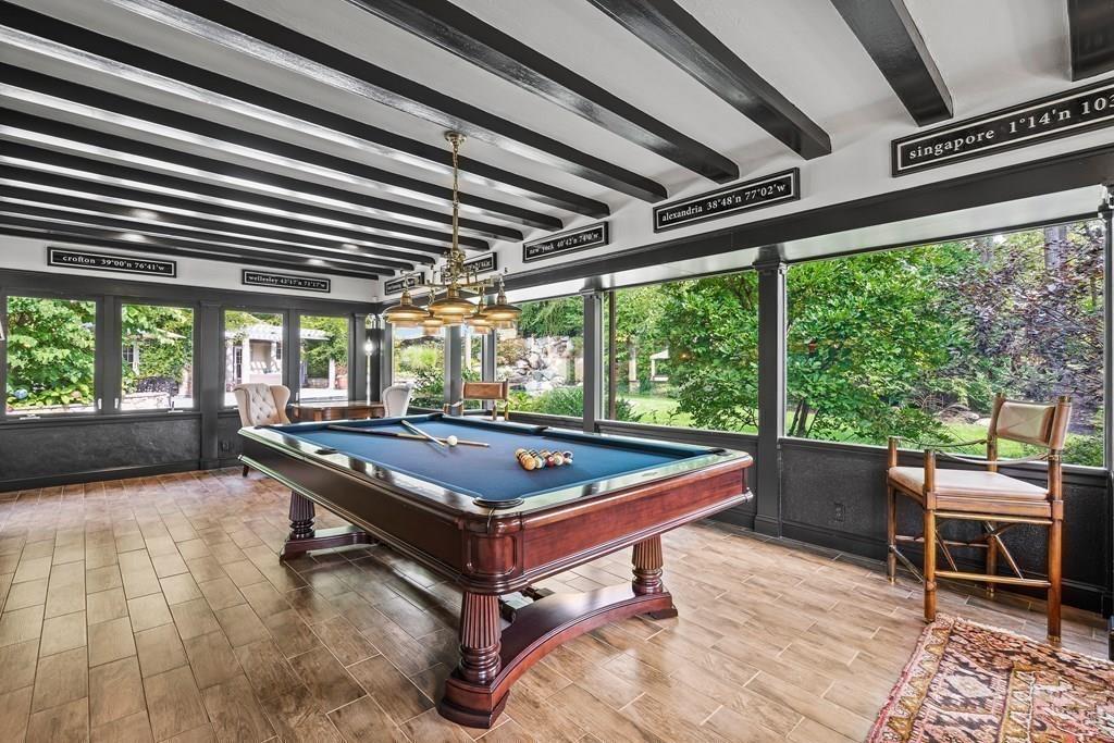 62-66 Temple Road Wellesley, MA 02482 - Photo 7 of 36 a room with wooden floor pool table and windows