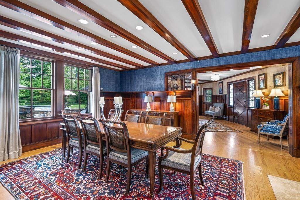 62-66 Temple Road Wellesley, MA 02482 - Photo 10 of 36 a dining room with furniture a rug and a large window